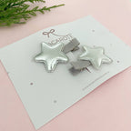 Dupla Clips Estrelas Prateadas P na Presilha